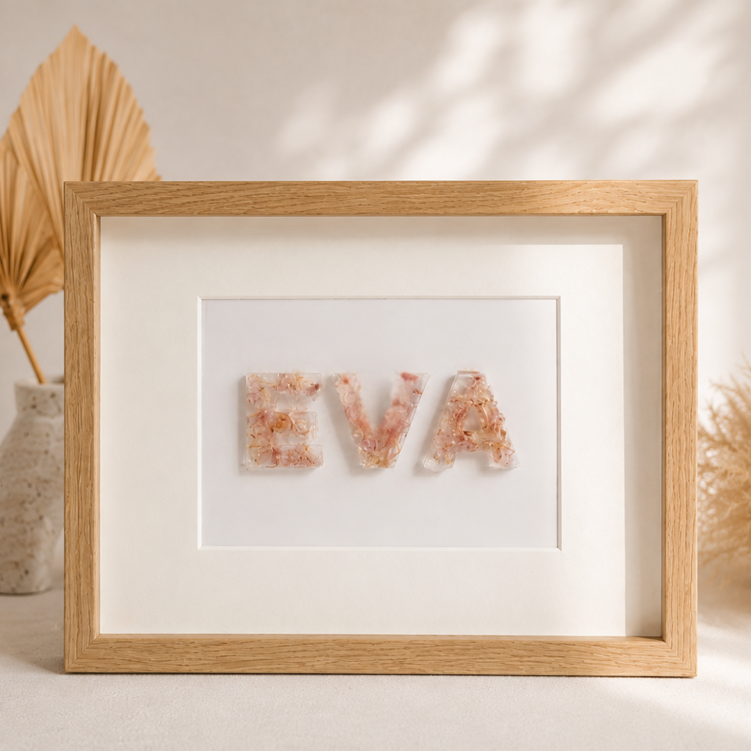 Personalised floral name frame — a name in resin letters filled with real preserved flowers, 20x30cm, handmade in the UAE by Ever After Bloom